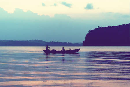 A small classic thai boat in the sea. Thai boat of fisherman prepare for cruisingFishing in the sea....