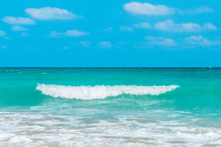 tropical sea under the blue sky. Beautiful tropical island. Andaman and Nicobar Islands. India. The horizon line divides the blue sea and turquoise water in the sea of the Indian ocean.の写真素材