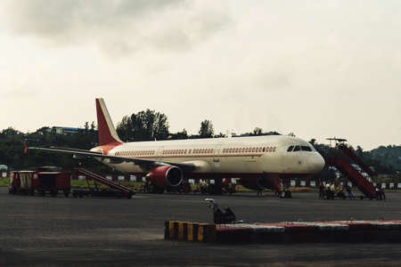 Aircraft on the runway in airport. plane on the runway during landing or disembarkation of...