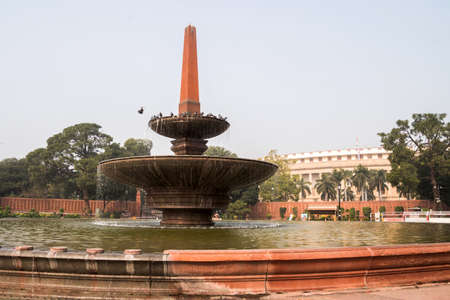 Fountain in front of the Sansad Bhawan, the Parliament House of India in New Delhiの写真素材