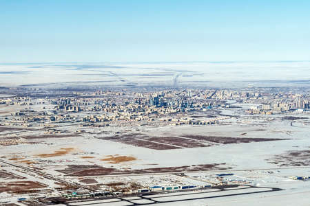 Top view of Urban contrasts in Astana, Kazakhstan. view from the height of bird flight. View from the plane to the capital of Kazakhstanの写真素材