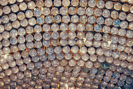 faceted beads of glass in the backgroundの写真素材