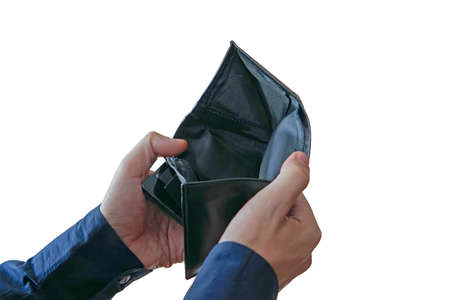 Money has a financial problem. Male hands opening an empty wallet with no money isolated on white background.の写真素材