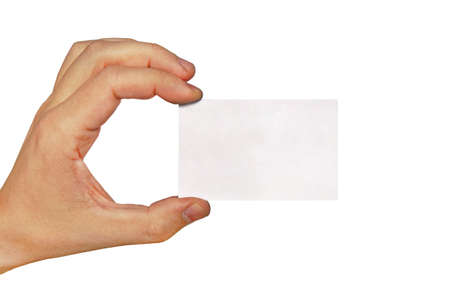 Businessman's hand holding blank paper business card, closeup isolated on white background. White business card in male hand isolated on white backgroundの写真素材