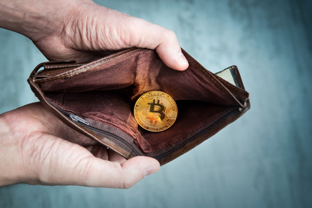 bitcoin coin in the leather walletのeditorial素材