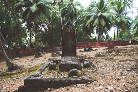 old iron forged old crosses in the cemetery. An grave in an abandoned cemetery of the 19th century in the Andaman Islands. shabby Christian Agila in the jungle. Asia. Ross island Indiaの写真素材