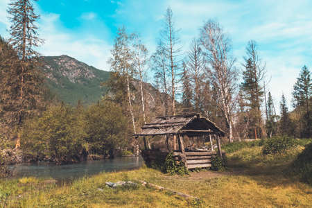 Wooden pergolas near the road in the Altai Siberia Russia. Beautiful mountain landscape.の写真素材