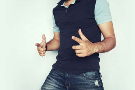 model man pointing forward with both hands, choosing you.の写真素材