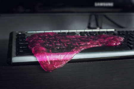 Slime is the ultimate tool to clean the keyboard from dust and dirtの写真素材