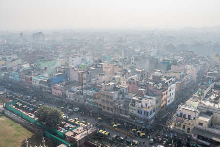 The streets of old Delhi. The view from the top. Dense construction of urban agglomeration in the overpopulated city.の写真素材