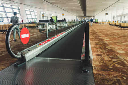 Beautiful departure lounge of New Delhi International Airport with travelatorのeditorial素材