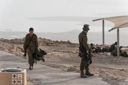 Soldiers are patrolling for security Israeli army military exercises in the early morning in the ruins of the fortress Massada. Masada. Israel. 23 October 2018のeditorial素材