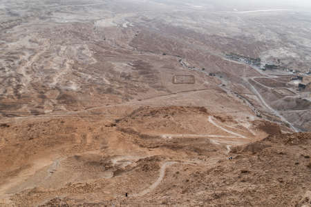 aerial view of the ruins of roman camp B at the masada fortress in the arava valley in israel. Historical ruins. Archaeological excavations in the desert.の写真素材
