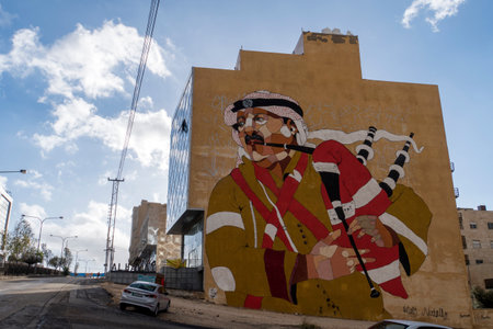 Graffiti on the wall of the building, Amman street. Jordan. 26 October 2018.のeditorial素材