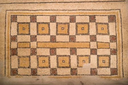 Ancient byzantine natural stone tile mosaics with with geometric patterns, Mount Nebo, Jordan,...
