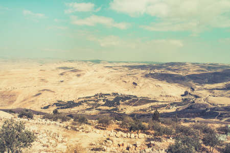 View from top of the Mount Nebo to the Jordanian desert valley. Desert land around the dead sea.