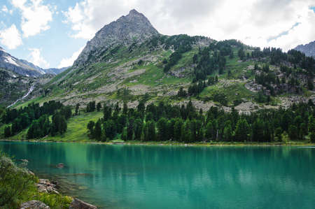 Beautiful mountain near Multinskoe lake with clear water in the Altai Republic Siberia Russiaの写真素材
