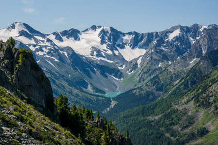 The view of the gorge with a river flowing from a mountain lake. The Altai Republic Siberia Russiaの写真素材