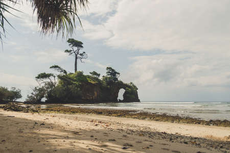 a sea arch in Neil island, Andaman and Nicobar, Indiaの写真素材
