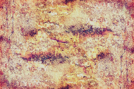 Close-up Textured background of multi-layer flaking paint on the wall. Mixing different colors of paints in the cleaved layers on the surface. Grunge texture with a deep patternの写真素材