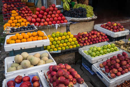 Market in south east asia. Traditional street Fruit market in Southeast Asia. A variety of fresh fruits on the counter street vendor. India, Goa, Kerala, South, Andaman Islands, port Blair,の写真素材
