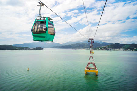 The view towards Nha Trang and VinPearl cable car from Nha Trang bay in Vietnam.の写真素材