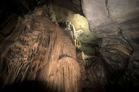 Limestone formations in karst cave at Cat Ba island, Vietnam. stalactites and stalagmites inside the caveの写真素材