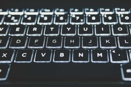 Illuminated Keyboard. White light on the laptop keyboard.の写真素材