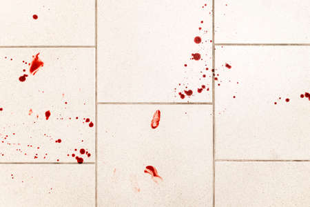 violence conceptual background which shows blood drops and splash is scary and dirty.の写真素材
