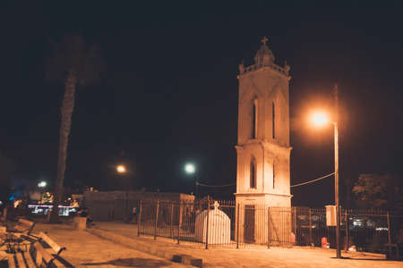 Old church bell, Ayia Napa, Cyprus. chapel in the night against the black skyの写真素材