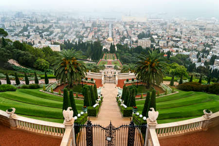 Beautiful panoramic picture of the Bahai Gardens in Haifa Israel. View from a height of a staircase with terraces extending all the way down the golden-domed Shrine The beauty of Haifaの写真素材
