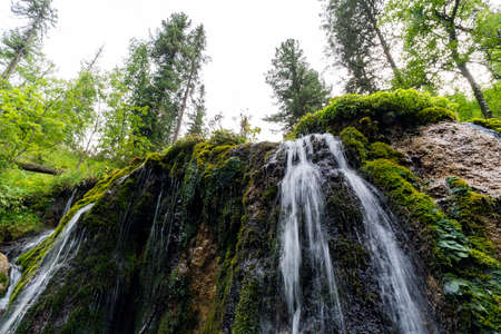 The waterfall in Altai mountains in Altai Republic. Russian summer in Siberia.の写真素材