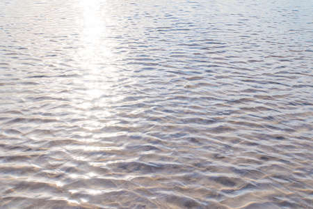 Sun glare on the bottom of the lake