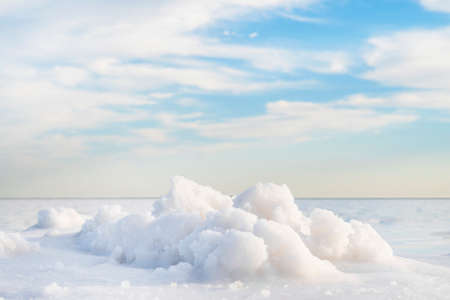 Rose water in a salt lake, extraction of sea salt - landscape background salt-mining plantの写真素材