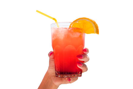 Close up female holds in hand on palm red drink in glass with orange isolated on white background. Proper nutrition, vegetarian drink, healthy lifestyle dieting concept.の写真素材