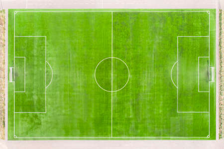 soccer field with lines on grass. real football field aerial view. empty stadium without peopleの写真素材