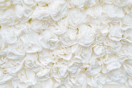 flower paper-craft texture background. White rose. unnatural artificial flowersの写真素材