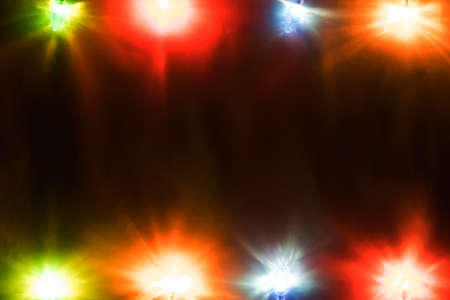 christmas celebration garland of light bulbs on wooden background copy space for inscriptions. View with copy spaceの写真素材