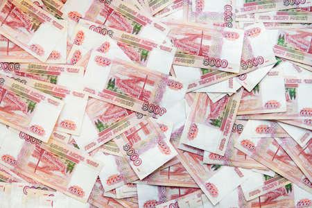 background of Bank of Russia notes. Paper Russian money. Banknotes. 5000 rubles. Finance. Cach.の写真素材