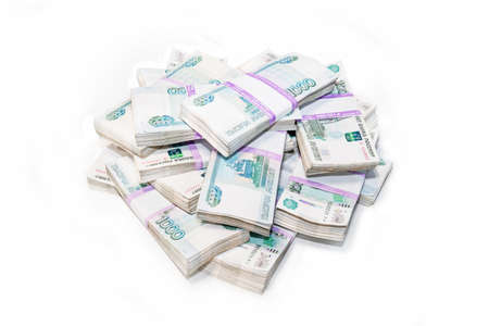 A big wad of money Russian banknotes. million rubles isolated on a white background.の写真素材
