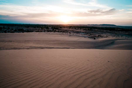 gorgeous landscape of Asian desert from the air. Dawn over the sand dunes in MUI ne Vietnam. Sunset over the horizonの写真素材