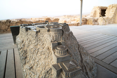 A miniature model of the summer palace of King Herod in zelot fortress Masada, Israel. View of model of the mountain with the palace built on its top. Masada. Israel. 23 October 2018のeditorial素材