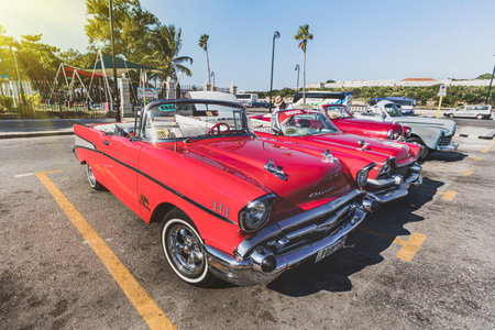 November 27, 2019, Havana, Cuba: Old Chevrolet with the castle of El Morro in the background. Retro...