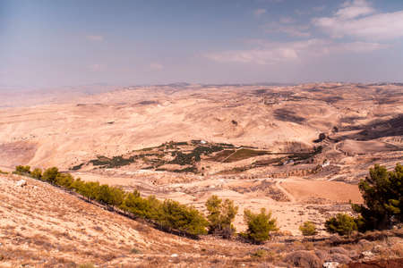 View from top of the Mount Nebo to the Jordanian desert valley. Desert land around the dead seaの素材 [FY310139094313]