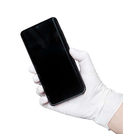man hand with white latex glove showing a black mobile phone screen isolated on a white background