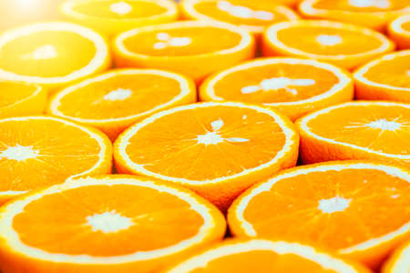 Sliced orange slices on a dark table. Healthy food, background. Orange