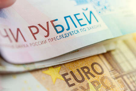 exchange of euros for rubles. currency devaluation. Banknotes close-up. The concept of the financial...