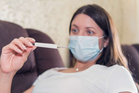 Girl with shortness of breath symptom of Coronavirus. check fever. COVID-19 Pandemic Coronavirus...