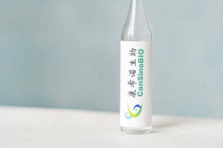 Glass bottle with Sinopharm, Chinese pharmaceutical company. January 18, 2021, Barnaul, Russia.のeditorial素材