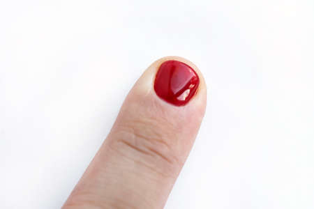 A man with painted nails. Design of male nails. men manicure isolated on a white background.の写真素材